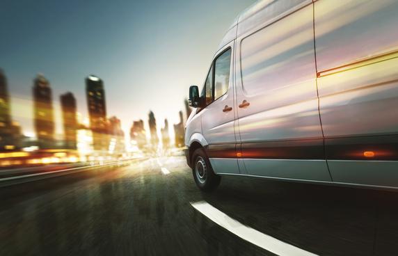 Locksmith van on the road at dusk